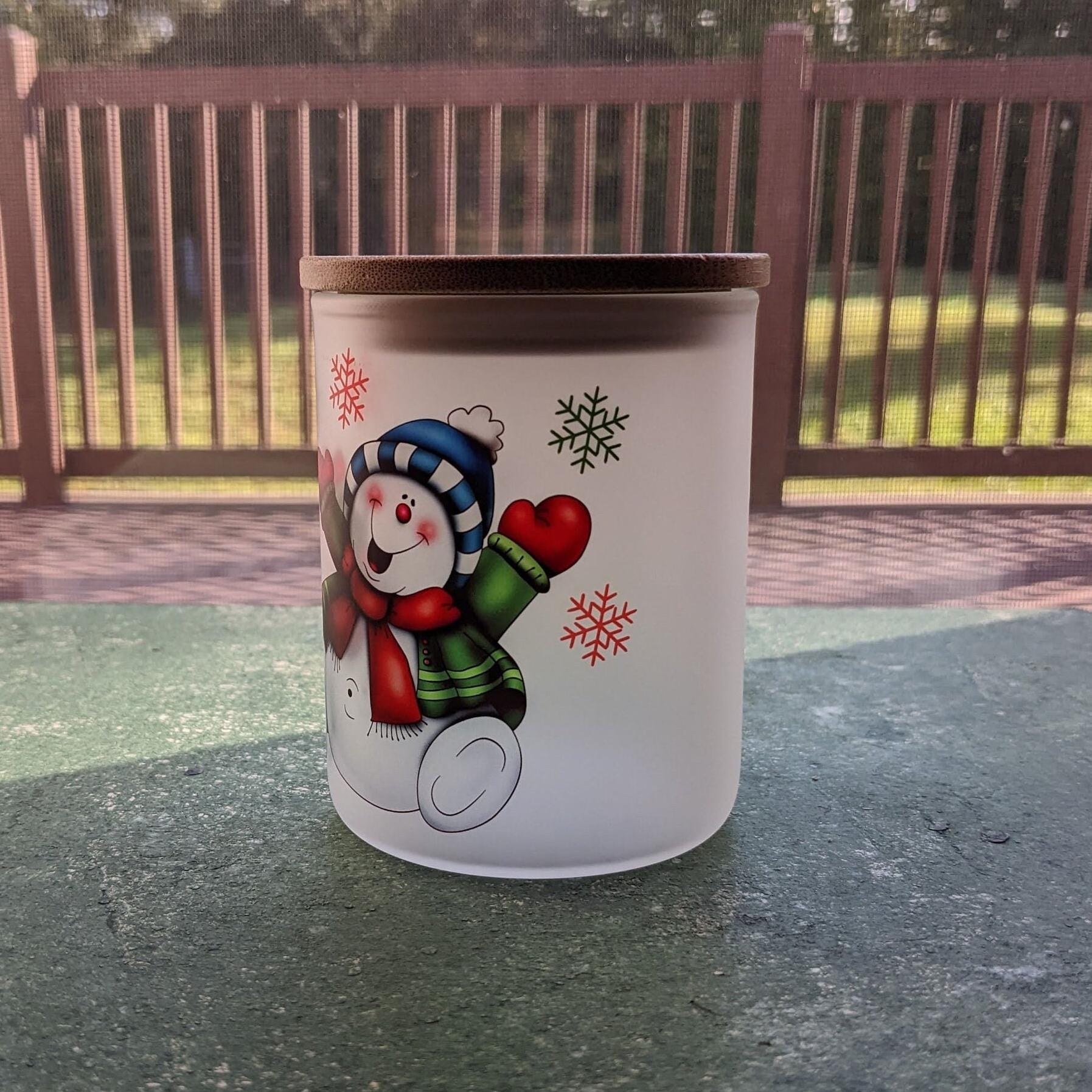 Snowman Candle Holder With A Battery Operated Flickering Tea Light