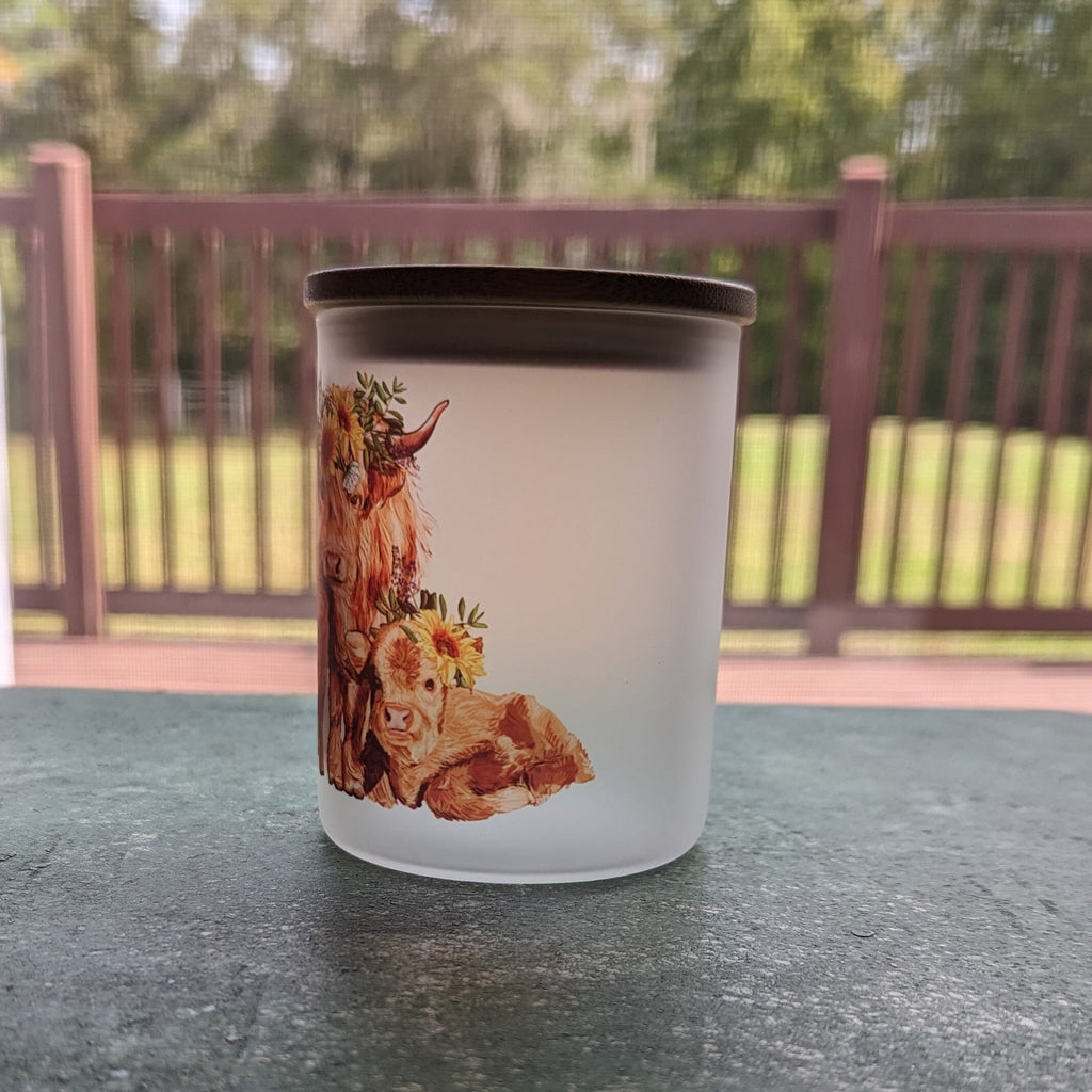 Glass Highland Cow Candle Holder With A Battery Operated Flickering Tea Light