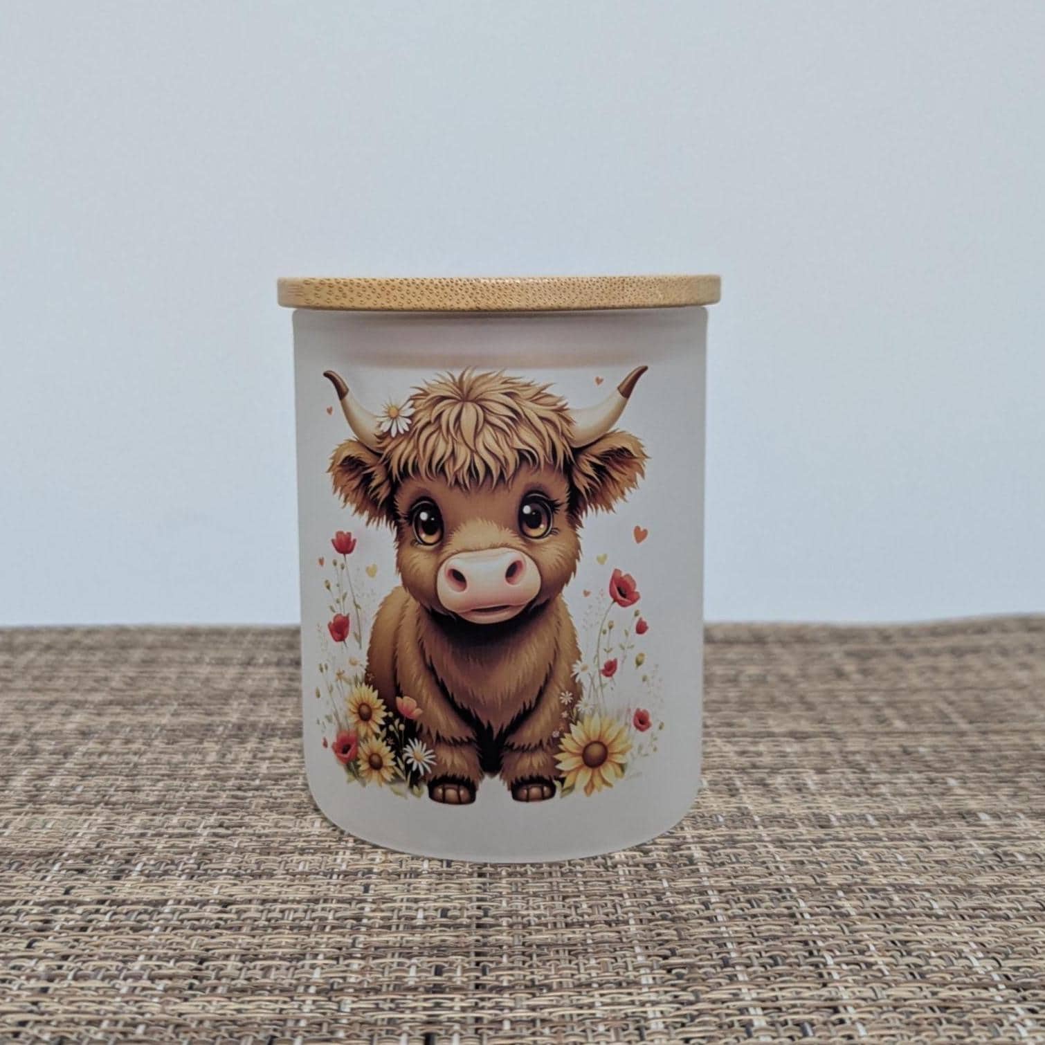 Cute Highland Cow Candle Holder With A Battery Operated Flickering Tea Light