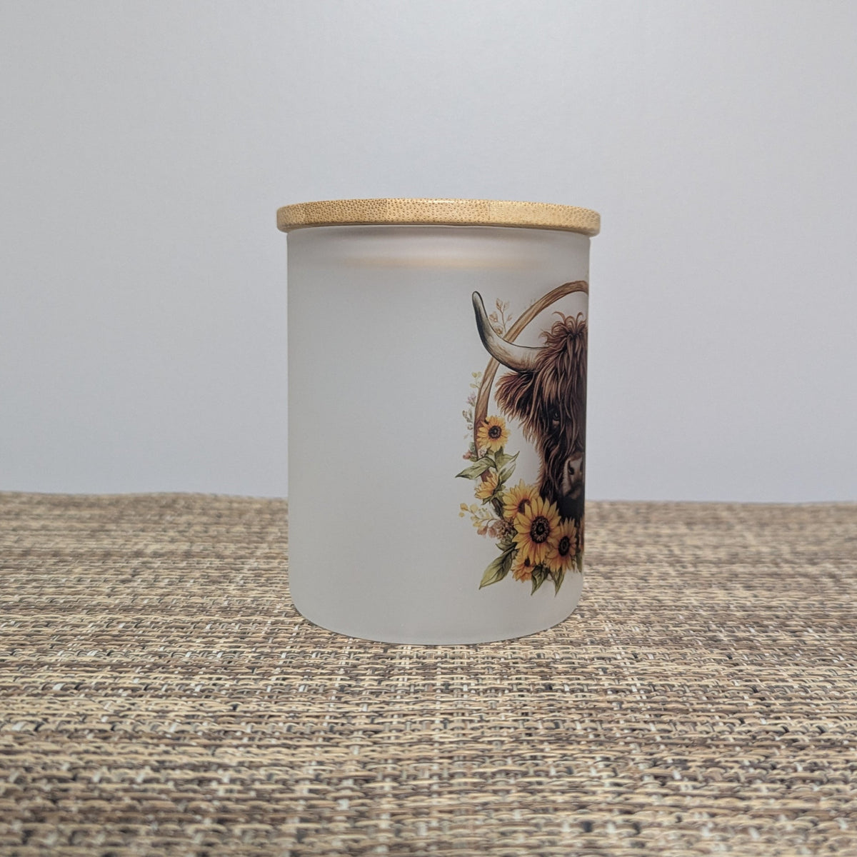 Glass Highland Cow Candle Holder With A Battery Operated Flickering Tea Light