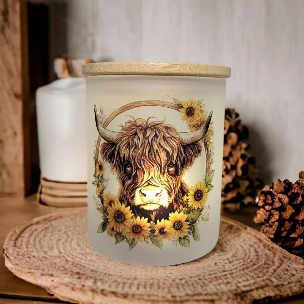 Glass Highland Cow Candle Holder With A Battery Operated Flickering Tea Light