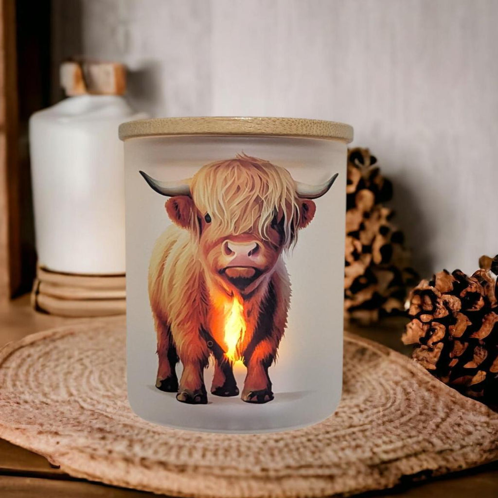 Highland Cow Candle Holder With A Battery Operated Flickering Tea Light